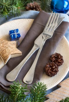 Christmas table setting with rustic decorations close up