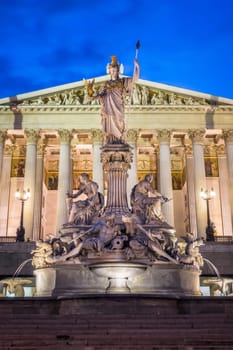 Pallas Athene fountain at night,illuminated landmark in front of the Austrian Parliament