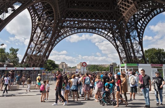 tourists at the Eiffel Tower in Paris