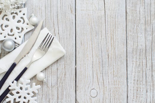 Silver pastel Christmas Table Setting with christmas decorations