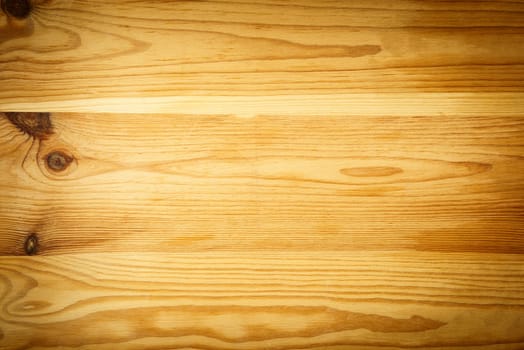 Pine wood background with vignette shot from above