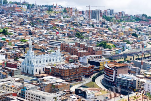 Cityscape and beautiful blue and white church in Manizales, Colombia