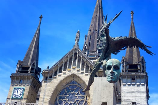 Basilica and Bolivar Condor statue in Manizales, Colombia