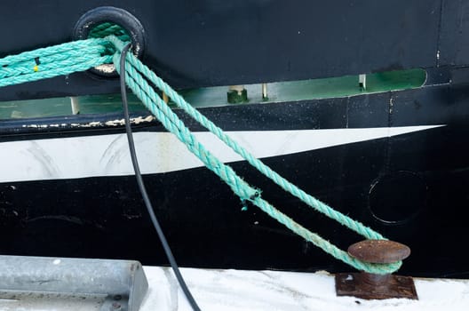 a mooring rope from the boat to land that secure the boat to land