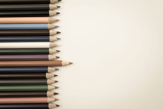 Colouring pencils isolated on white background,education concept image with copy space available. Vintage filter applied