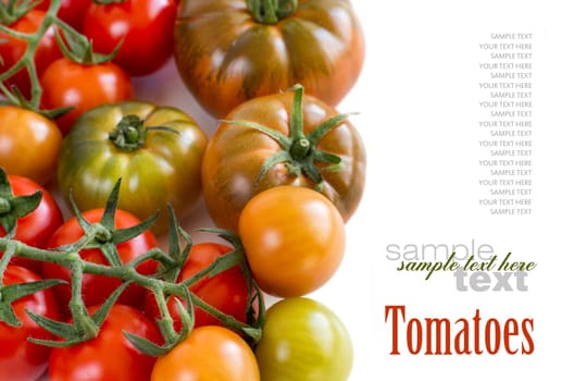 Fresh costoluto and cherry tomatoes isolated on white background