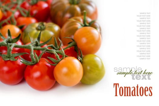 Fresh pachino and cherry tomatoes isolated on white background