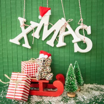 Small gifts for Christmas with XMAS lettering on Gruen
