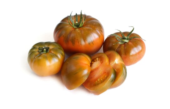 4 Fresh costoluto tomatoes isolated on white background
