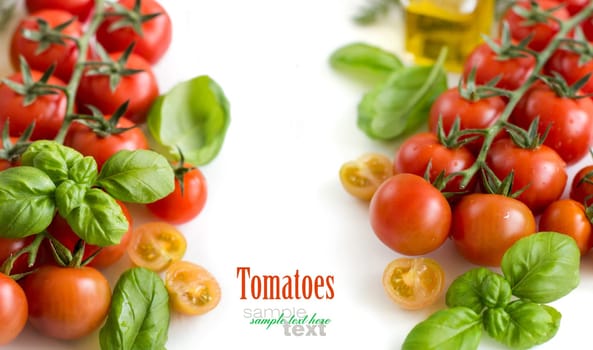 Cherry tomatoes and basil isolated on white background