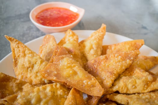 Homemade fried dumplings serving on the plate, stock photo