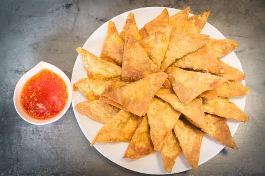 Homemade fried dumplings serving on the plate, stock photo