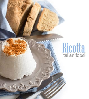 Italian ricotta cheese and homemade bread isolated on white