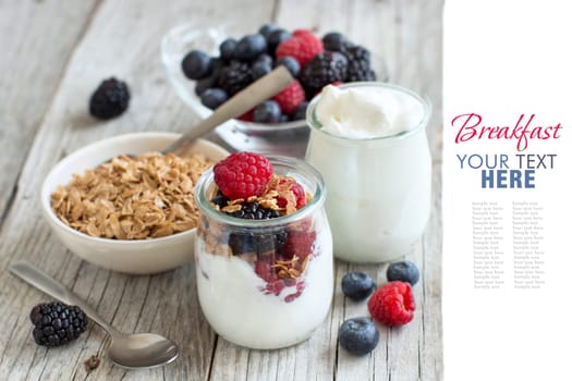 Healthy breakfast with Fresh greek yogurt, flakes and berries