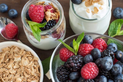 Healthy breakfast with Fresh greek yogurt, flakes and berries