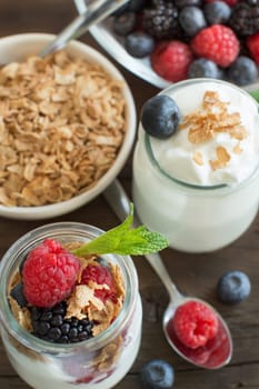 Healthy breakfast with Fresh greek yogurt, muesli and berries