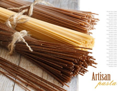 Italian spaghetti on the old wooden table close up