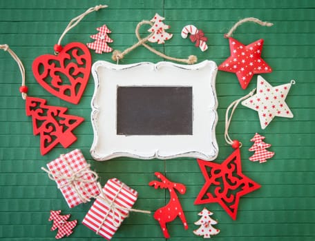Colorful decoration for Christmas on a rustic green background
