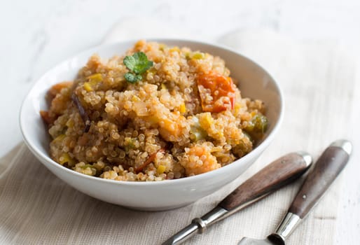 Cooked Quinoa with vegetables and shrimps in a bowl