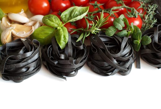 Black Tagliatelle pasta with cherry tomatoes, garlic and herbs