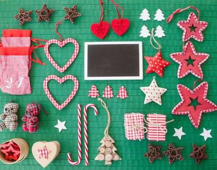 Colorful decoration for Christmas on a rustic green background