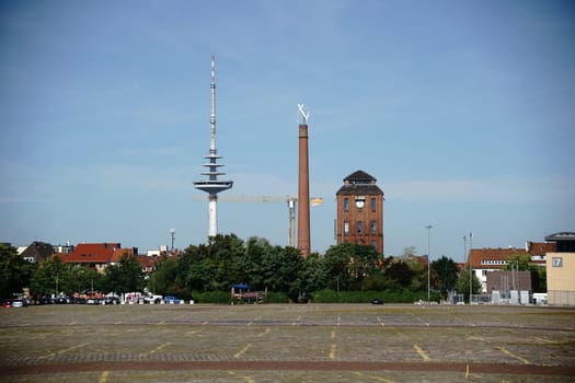 The Bürgerweide car park in Bremen at the ÖVB Arena with the Messeturm in the background.