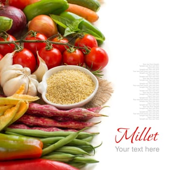 Raw millet in bowl and vegetables isolated on white