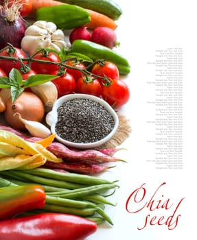 Raw chia seeds in a bowl and fresh vegetables isolated on white