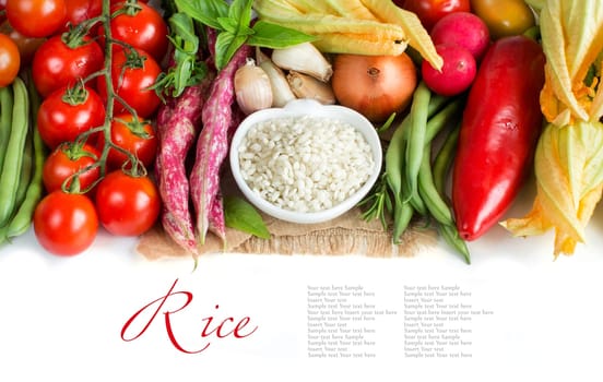 White rice in bowl and fresh vegetables isolated on white