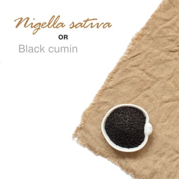 Nigella sativa or Black cumin in a bowl on burlap