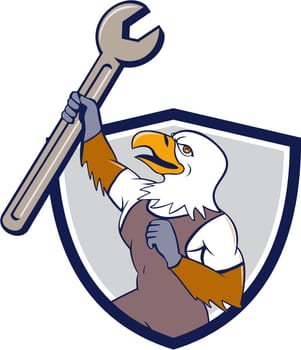 Illustration of a mechanic american bald eagle holding spanner looking to the side set inside shield crest on isolated background done in cartoon style.