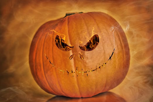 dark background pumpkin on orange background,halloween theme