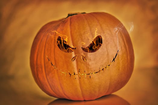dark background pumpkin on orange background,halloween theme