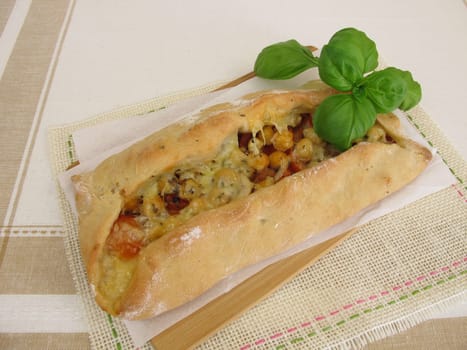 Stuffed pide bread with tomatoes,chickpeas and cheese