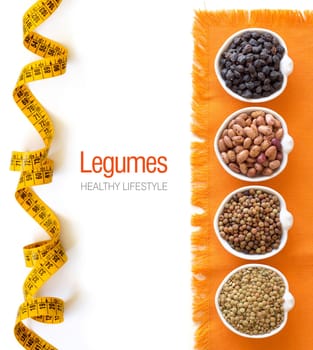 Variety or legumes in bowls isolated on white
