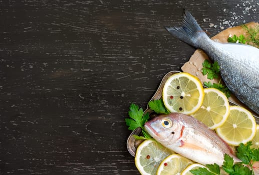 Fresh fish on a dark vintage background