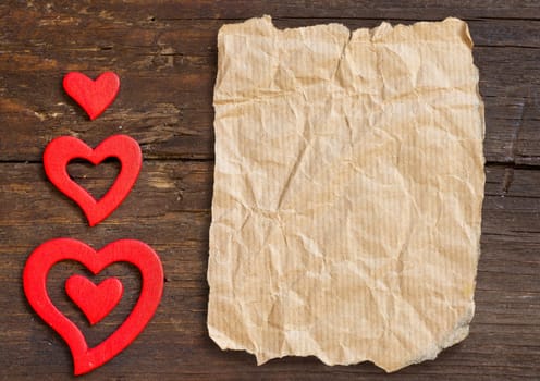 Rustic hearts on a old wooden background
