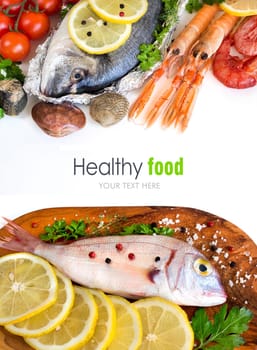 Fresh fish, seafood and vegetables isolated on white