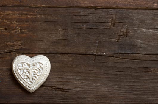 Rustic heart on a old wooden background