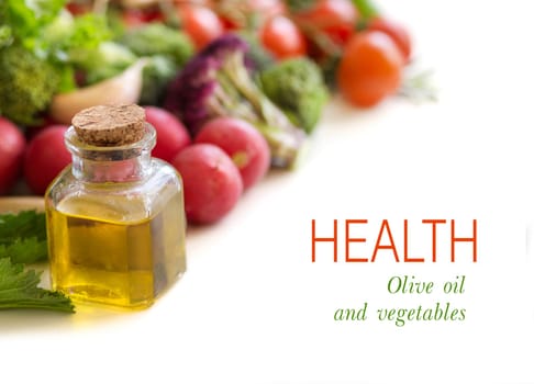 B ottle of olive oil and vegetables isolated on white border