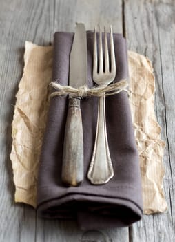 Vintage Table setting on napkin and craft paper