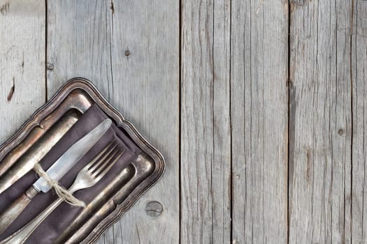Vintage Table setting on napkin and metal tray