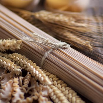 Whole wheat italian pasta with spikes close up