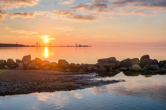 Beautiful sunset on the sea, a type on port