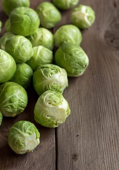 Brussels sproutsl on an old wooden table border