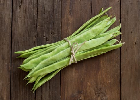 Piattoni green beans on the old wooden table