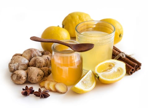 Honey, lemon and ginger tonic and ingridients close up
