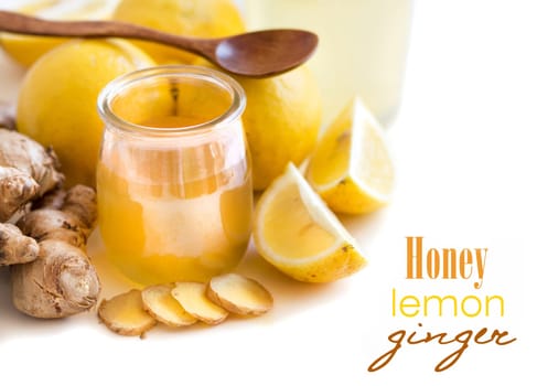Honey, lemon and ginger isolated on white