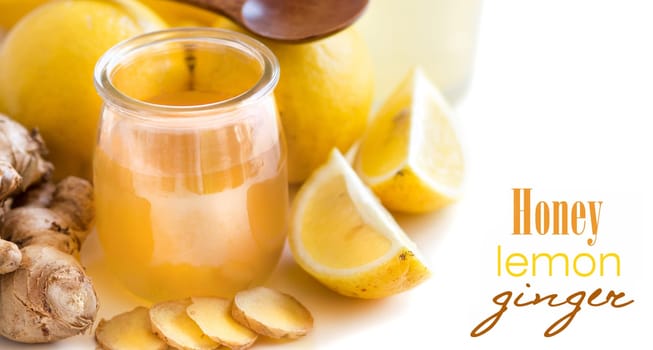 Honey, lemon and ginger isolated on white