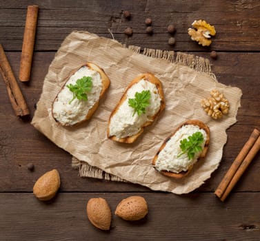 Toasted bread with a salted codfish mousse on a craft paper